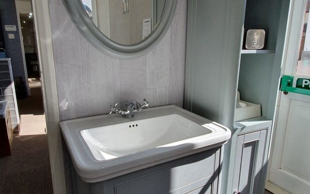 10 - Hickman Supplies Bathroom Showroom - Vanity Unit with a large oval Mirror above