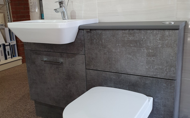 08 - Hickman Supplies Bathroom Showroom - Fitted Unit featuring a Vanity Basin and Back-to-wall Toilet